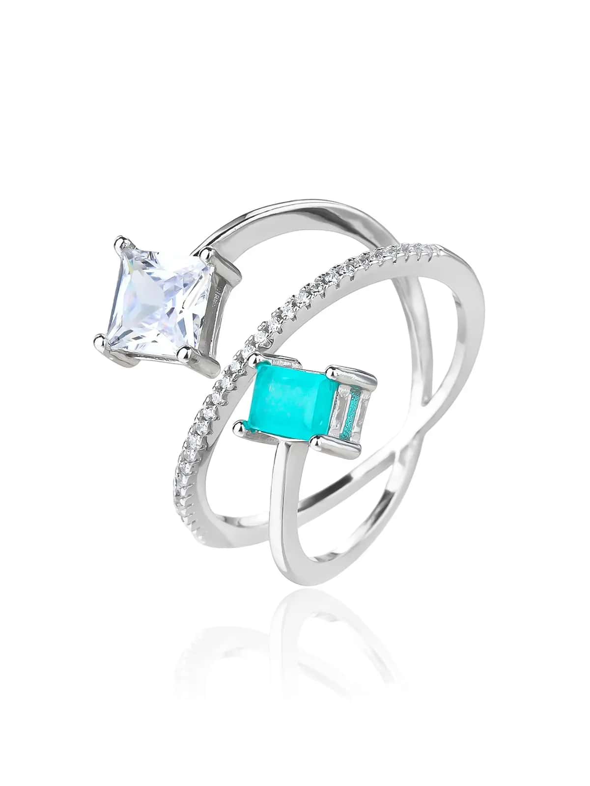 Anillo de diseño de plata con piedras turquesa y blancas
