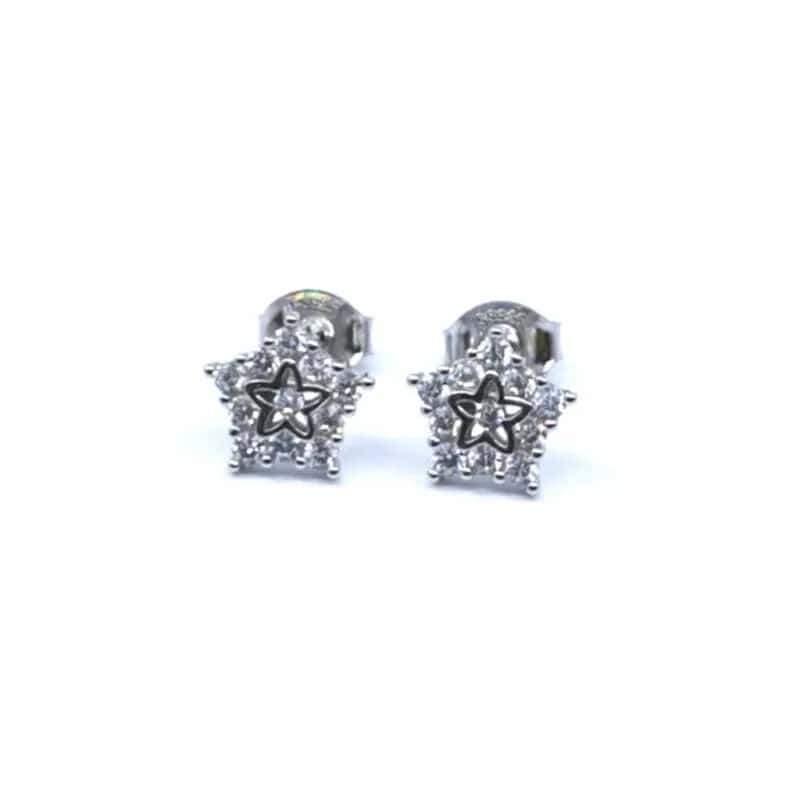 Pendientes de estrella de plata con piedras blancas